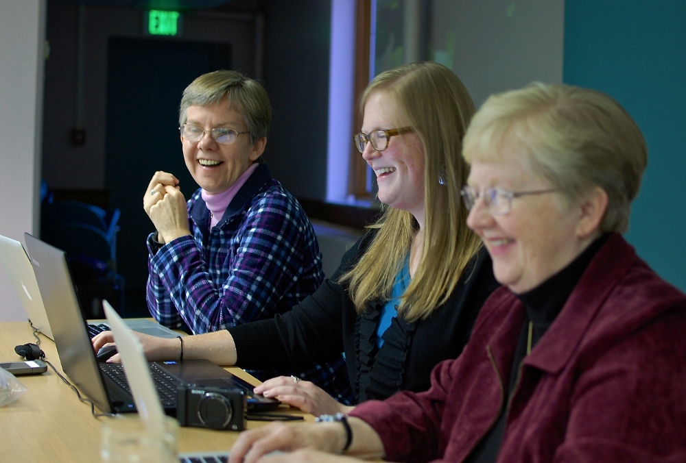From left, Benedictine Sr. Jennifer Mechtild Horner, A Nun's Life's Jane Aseltyne, and Benedictine Sr. Juliann Babcock run the live chatroom during the recording of the Nov. 14 "Ask Sister" podcast. (Dan Stockman)