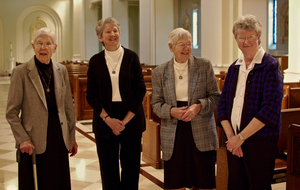 From left: Benedictine Srs. Mary Carmel Spayd, Rosemary Dauby, Mary Carmen Spayd and Agnes Marie Dauby talk about what it's like to have a sister at the same convent, the Immaculate Conception Monastery in Ferdinand, Indiana. (GSR photo / Dan Stockman)