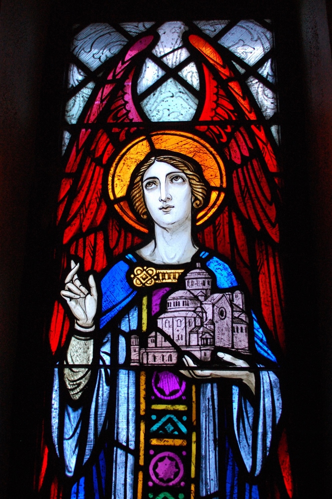 The stained-glass window in the church at the Immaculate Conception Monastery in Ferdinand, Indiana, is known as "the monastery angel" because she holds the monastery in her hand. (GSR photo / Dan Stockman)