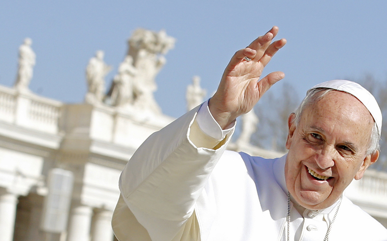 Pope Francis waves as he leads the weekly audience in St. Peter's Square at the Vatican on Feb. 18, 2015. (CNS/Reuters/Giampiero Sposito)
