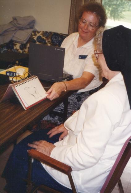 Sr. Gabriel Mary Spaeth, left, is shown testing the late Sr. M. Alcantara Franke. (Photo courtesy of the School Sisters of Notre Dame, Mankato, Minn.)