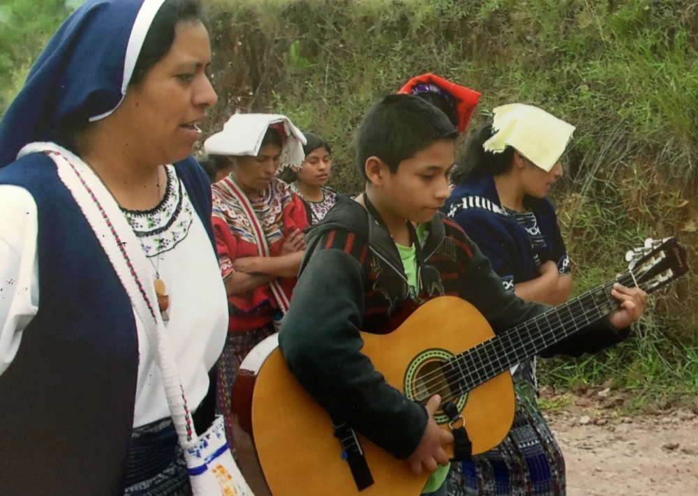 Missionaries of the Eucharist Sr. Flora Catalina walks with members of a youth group. (Provided photo)