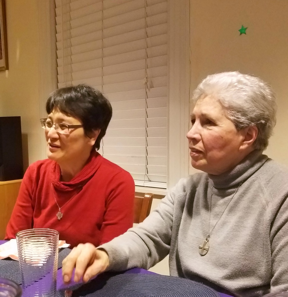Sr. Jocelyn Quijano of the Philippines, left, and Sr. Maria-Teresa de Los Rios of Spain have a conversation at a recent evening meal at the Holy Name of Jesus Convent in Upper Manhattan. (GSR photo / Chris Herlinger)