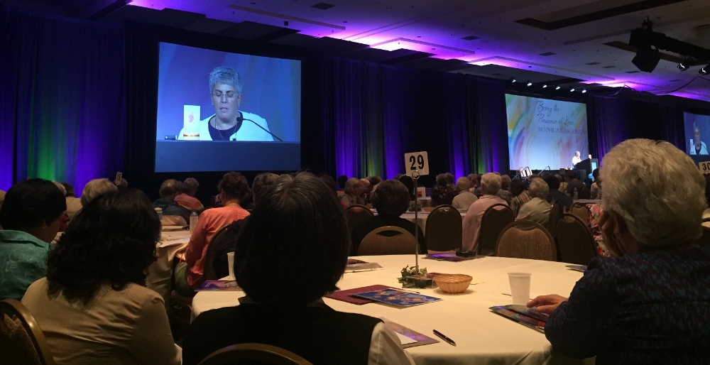 Sisters watch St. Joseph Sr. Mary Pellegrino give the president's address Aug. 10 at the annual assembly of the Leadership Conference of Women Religious, held Aug. 8-11 in Orlando, Florida. (GSR/Soli Salgado)