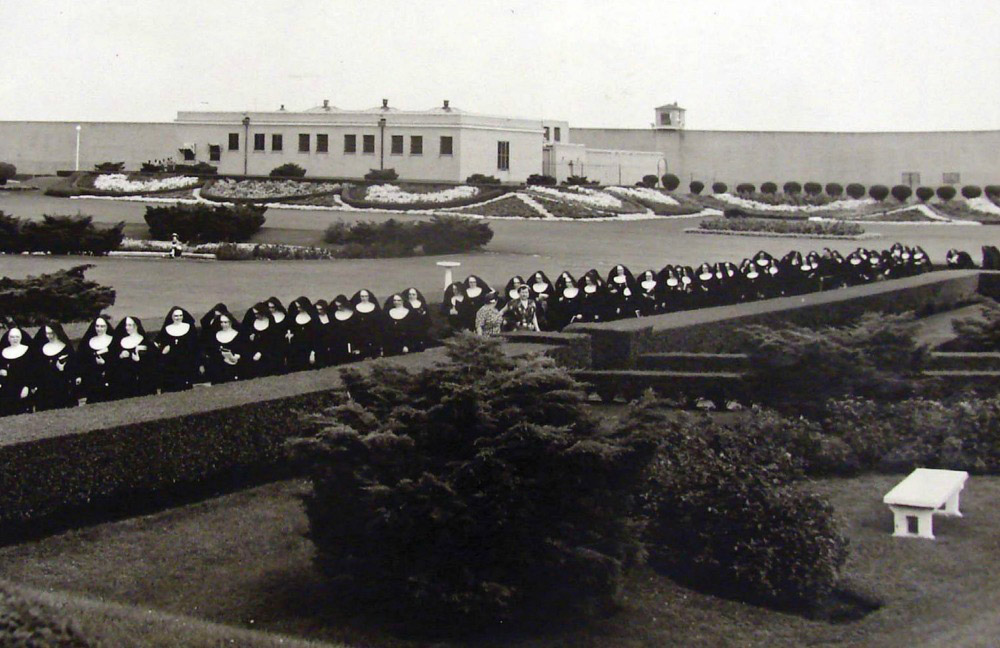 Sisters of St. Francis of Mary Immaculate leave the Stateville Penitentiary in Joliet, Illinois, in 1954. The sisters began to minister to Joliet inmates in 1887, teaching classes and eventually also singing in the choir for Mass at the prison. (Provided photo)