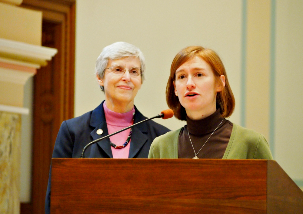Annie Klapheke professes her first vows with the Sisters of Charity of Cincinnati on Dec. 10, 2016, as the congregation's president, Sr. Joan Cook, looks on. (Provided photo)