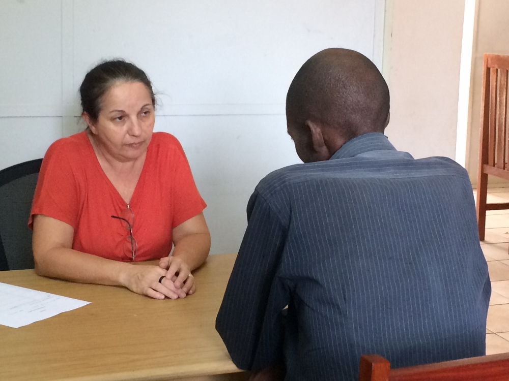 Sr. Leonir de Fátima Fabris gives psychosocial support to a man living with HIV. "Men often have more difficulties to talk about their sentiments. They might seem normal from the outside, but inside they might be suffering a lot," she said. (GSR photo / Matan Rosenstrauch)