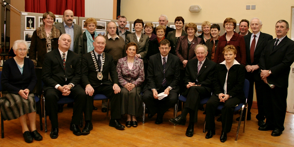 Sr. Maureen Lally, seated, center, with representatives of the 18 communities that are part of the Tóchar Valley Rural Community Network in 2000. (Provided photo)