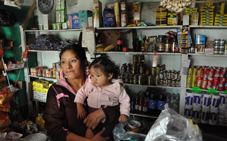 Convenience store owner Oralia Velasquez, 26, says the Marlin Mine has helped improve business throughout San Miguel Ixtahuacán. (GSR/J. Malcolm Garcia)
