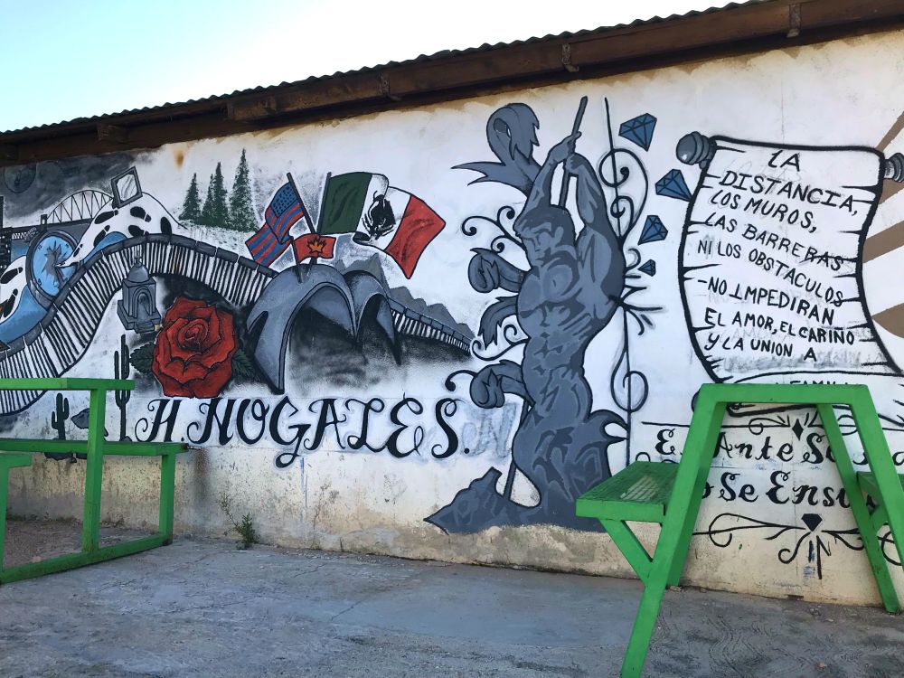 A mural in Sr. Tracey Horan's new neighborhood in Nogales, Sonora, that reads, "Distance, walls, barriers nor obstacles; they won't impede love, care and union." (Tracey Horan)