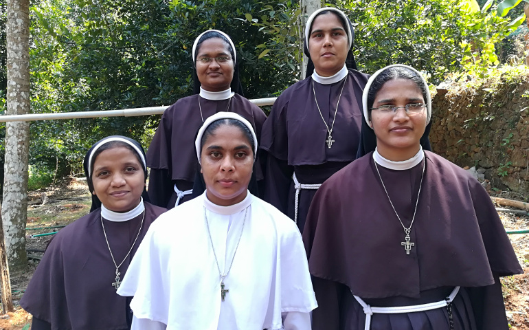 Five Missionaries of Jesus sisters protested the alleged rape of their former superior by a bishop at their Kuravilangad convent in Kerala. Front row, from left, are Josephine Villoonnickal, Ancitta Urumbil and Neena Rose. Second row, from left, are Anupama Kelamangalathuveli and Alphy Pallasseril. (Saji Thomas)