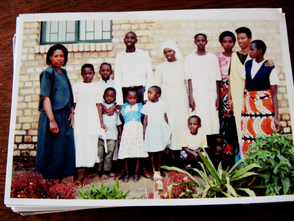 An old photo of some of the children at the Abizeramariya orphanage. Pacifique Uwimbabazi is in the center in a white dress. Two of the other children in the photo are now studying at Agahozo-Shalom Youth Village, a prestigious boarding school where Uwimbabazi completed her high school studies. (GSR photo / Melanie Lidman)