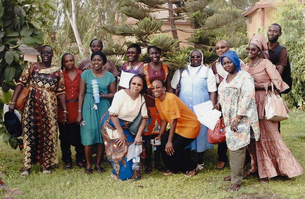 Sr. Reine Marie Badiane with the members of the offices of the parents' association during an outing with five of the St. Bernadette School's best students (Courtesy of Sr. Reine Marie Badiane)