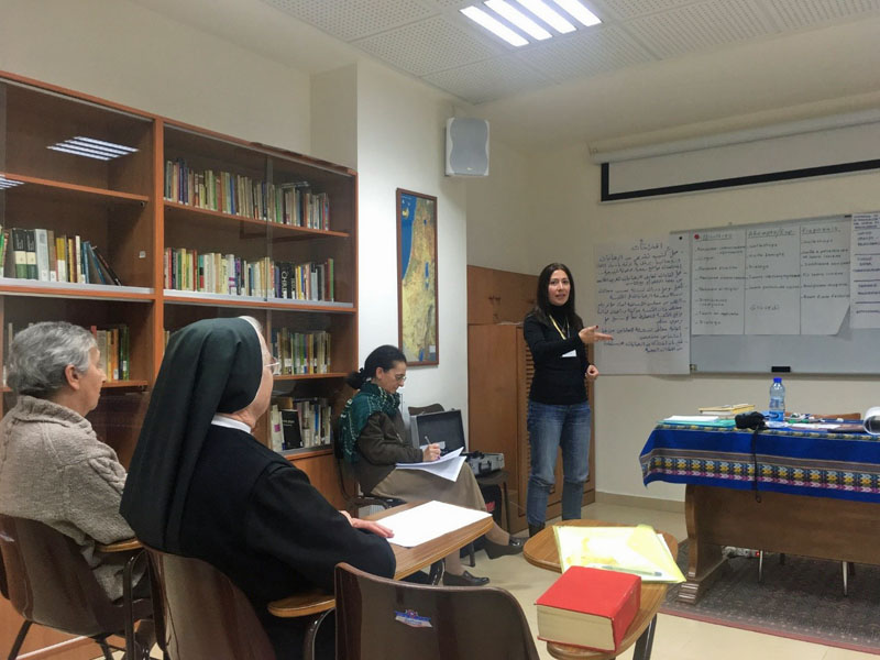 Natalia Liviero presents a group discussion to about 40 sisters, Abouna Marco and the nuncio of Israel and Cyprus, Archbishop Leopoldo Girelli. It was the first time she spoke in public in Italian: "I felt accomplished when the sisters congratulated me for my performance." (Provided photo)