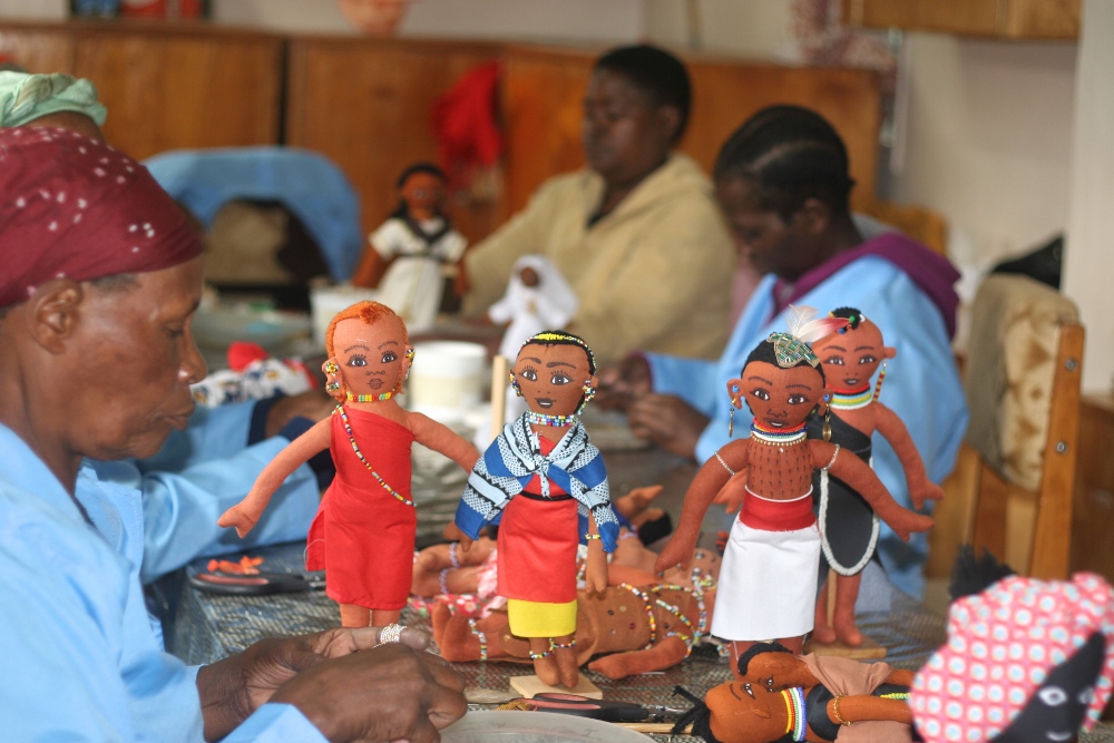 Women at Dolly Craft sewing project usually work on making African dolls. They used special beads to make a rosary gift for Pope Francis. (GSR photo / Lilian Muendo)