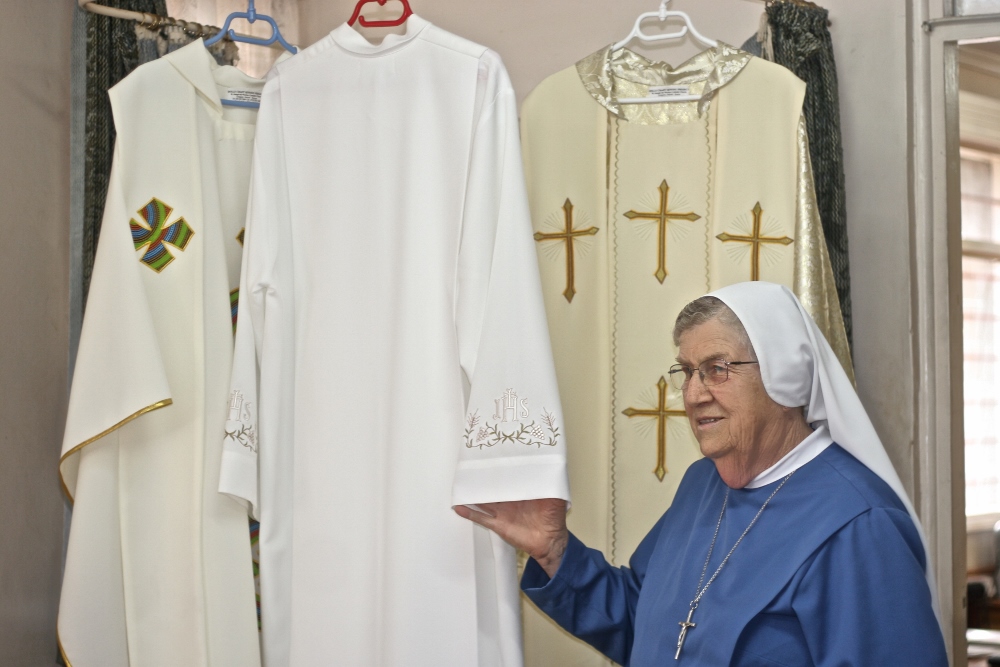 Sr. Ida Lagonegro shows the vestments that Pope Francis will wear during his visit to Kenya created by the women at Dolly Craft. (GSR photo / Lilian Muendo)