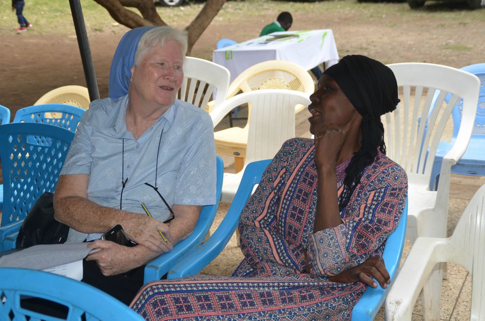 Mercy Sr. Mary Killeen talks with a parent whose children attend one of the schools Killeen runs in the Mukuru slum in Nairobi, Kenya. (Rose Achiego)