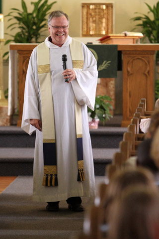 Msgr. William Hanson smiles as he delivers his homily during Mass at Infant Jesus Church in Port Jefferson, N.Y., in 2011. (CNS/Long Island Catholic/Gregory A. Shemitz)