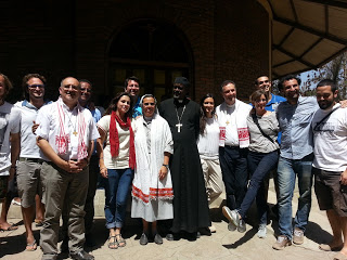 A group of volunteers pose with the Rector Major Don Angel Fernandez Artime. (Christian E. Ruehling)