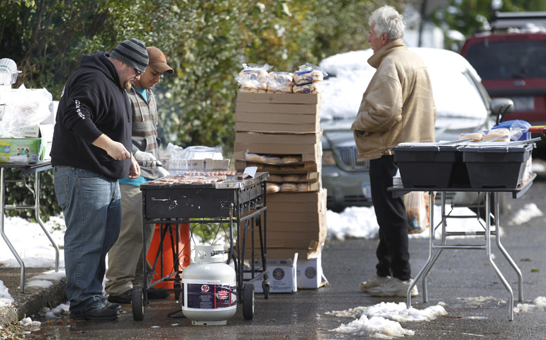 Volunteers grill food Nov. 8 for people affected by Hurricane Sandy in Staten Island, N.Y. (CNS/Bob Roller) 