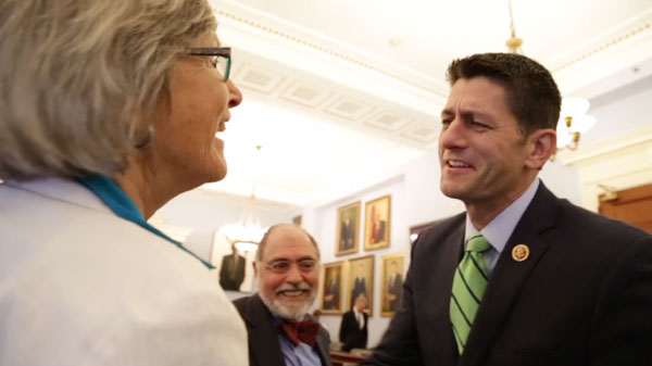 Sr. Simone Campbell discussing budget issues with U.S. Sen. Paul Ryan. Campbell was one of four panelists who testified July 30, 2013 before the Senate budget committee during a session dedicated to "The War on Poverty: A Progress Report." Sen. Ryan's claim that his budget was justified under Catholic Social Teaching was a major impetus for Campbell in launching her first Nuns on the Bus tour. The hearing in 2013 came after the second tour and provided her an opportunity to bring real stories about poverty to the lawmakers. (Melissa Regan)
