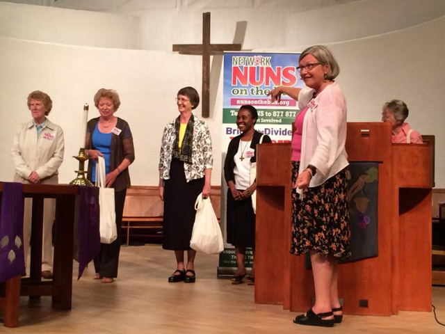 Social Service Sr. Simone Campbell, second from right, introduces the sisters riding on the first leg of the Nuns on the Bus 2015. (GSR/Tom Fox)