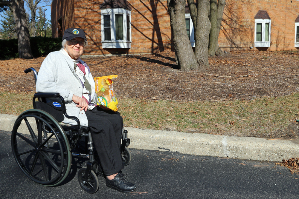 Benedictine Sr. Vivian Ivantic on her rounds of feeding the squirrels on Feb. 22. (Courtesy of the Benedictine Sisters of Chicago)