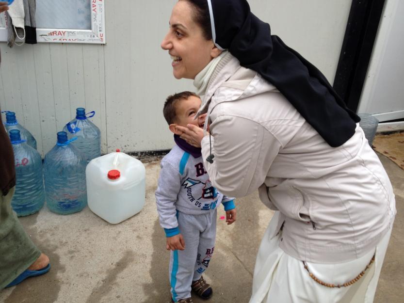Dominican Sr. Ban hugs one of her students. (Courtesy of Dominican sisters)