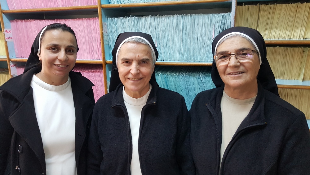 Dominican Srs. Maryan Kame, Najma Habash and Sara Alo at the Mother of Mary Clinic in Zarqa, Jordan. (GSR photo / Chris Herlinger)