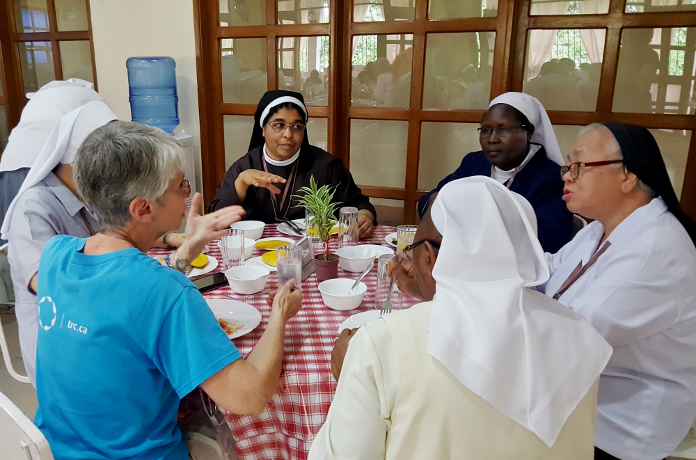 Sisters from around the world connect over a meal at the November 2017 delegates meeting of the International Union of Superiors General in Manila, the Philippines. (GSR photo / Gail DeGeorge)