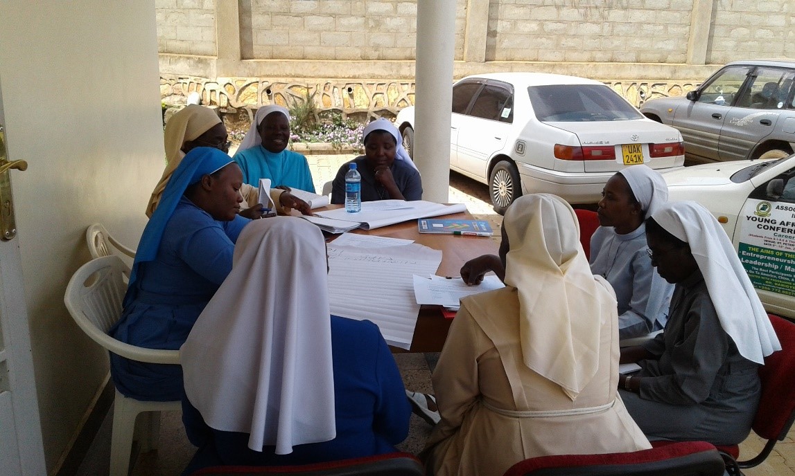 Women religious discuss how to develop a universal child-protection policy as part of Ugandan congregations' response to the country's 2016 rules on child protection. (Courtesy of Sr. Alice Jacan)