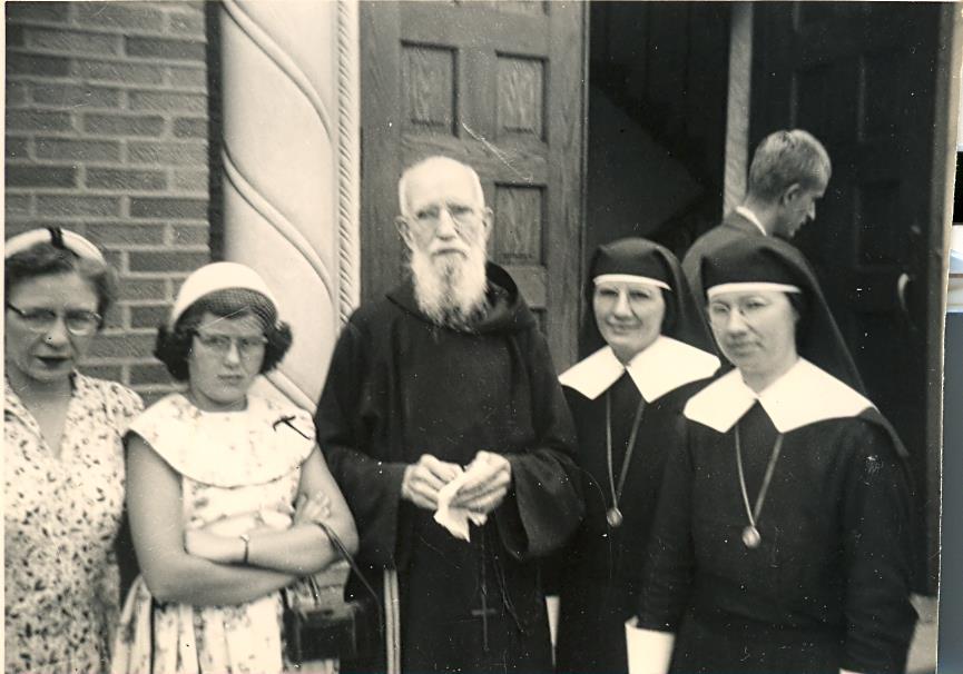 Fr. Solanus Casey with Our Lady of Victory Missionary Sisters in an undated photo (Courtesy of Our Lady of Victory Missionary Sisters)