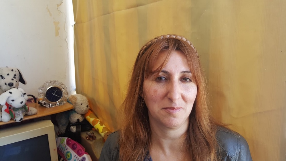 Aayda Merhej at her family's apartment in Beirut, Lebanon. (GSR photo / Chris Herlinger)