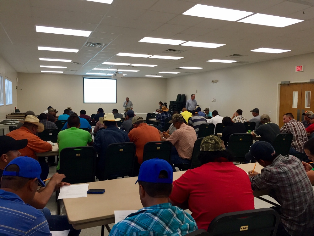 People attend a full wages and hours class, part of the Farm Labor Supervisor Training Program (Sharon Zavala)