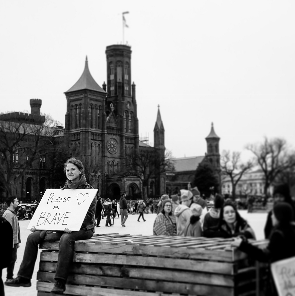 A Women's March participant rests after about five hours of being in the Washington, D.C., crowd. (Colleen Gibson)