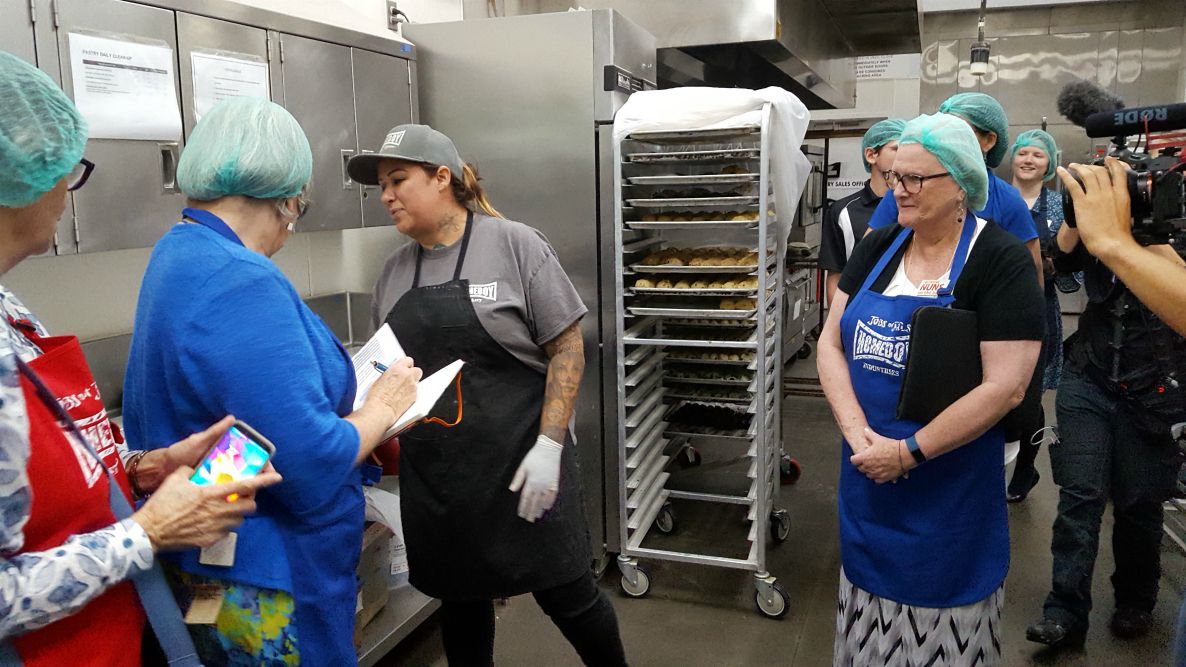Christine, the pastry chef at Homeboy Industries, helps us bake cookies Oct. 8 (GSR photo / Michele Morek)