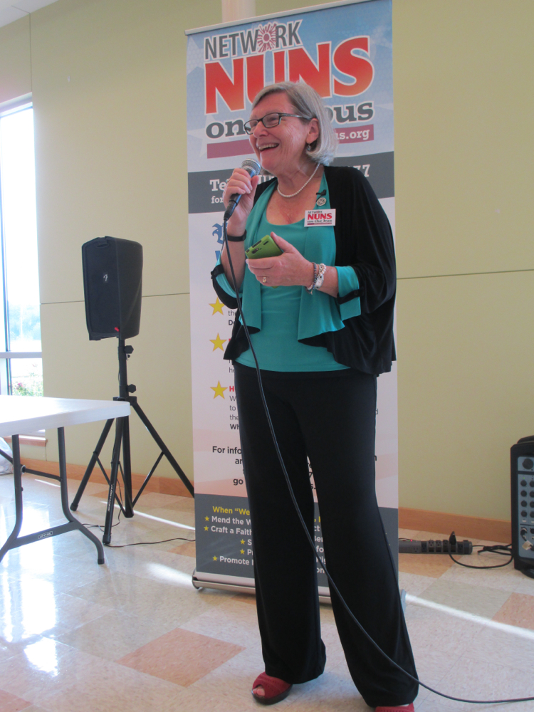 Sr. Simone Campbell talks to residents of Council Bluffs, Iowa, at a town hall meeting Sept. 18 during Day Two of the 2014 Nuns on the Bus tour. (Jan Cebula)