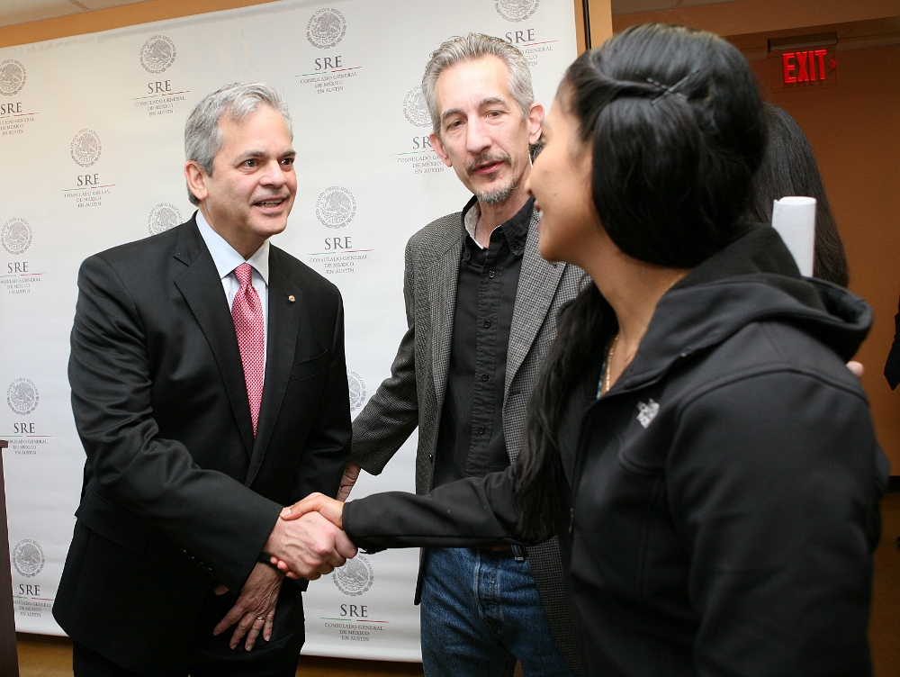 Austin Mayor Steve Adler, left, shakes the hand DACA recipient Areli Zarate while Ken Zarifis, president of Education Austin makes the introduction following a press conference announcing the formation of a coalition to educate immigrants about their rights. (GSR photo / Nuri Vallbona)