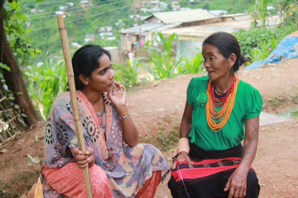 Sr. Janet Tellis chats with a woman from the Naga tribe. (Photo provided by Janet Tellis)