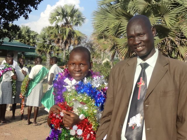 A father and his daughter who graduated in 2014 from Loreto in Rumbek. (Courtesy of Solidarity with South Sudan)