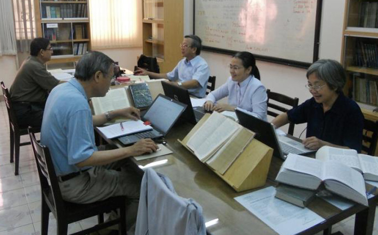 Sisters and priests from various congregations work together to translate the Bible into Vietnamese. (Courtesy of the Liturgy of the Hours Group)