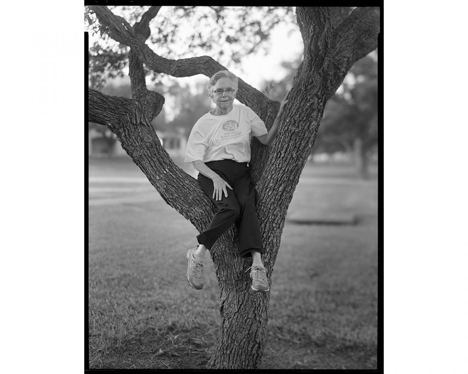 St. Joseph Sr. Rita Ann Teichman, who volunteered with Elmaleh at the Humanitarian Respite Center in McAllen, climbed a tree without prompt for a portrait. "All of the nuns are super youthful, but Rita Ann, she just jumped in that tree like it was nothing