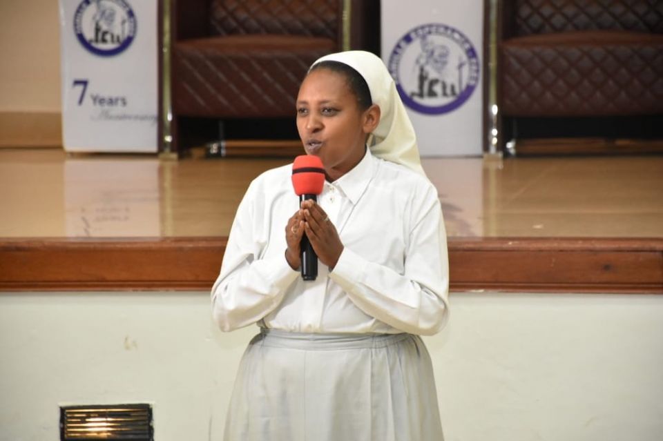 Sr. Immaculate Uwamariya of the Bernardine Sisters addresses members of Famille Espérance during the December 2019 celebration of the seventh anniversary of the organization. (Aimable Twahirwa) Sr. Immaculate Uwamariya of the Bernardine Sisters addresses members of Famille Espérance during the December 2019 celebration of the seventh anniversary of the organization. (Aimable Twahirwa)