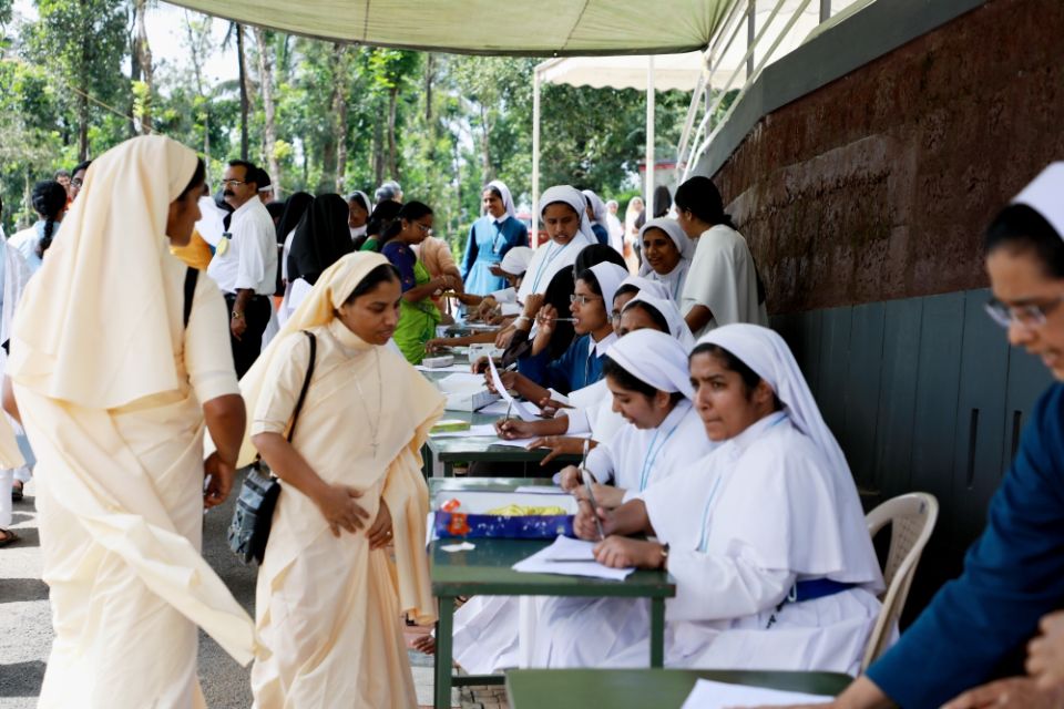 Catholic nuns register their names for a prayer gathering to address negative media coverage of religious life on Sept. 15 at the Pastoral Centre of Dwaraka parish in Kerala, India. (Saji Thomas) Catholic nuns register their names for a prayer gathering to address negative media coverage of religious life on Sept. 15 at the Pastoral Centre of Dwaraka parish in Kerala, India. (Saji Thomas)