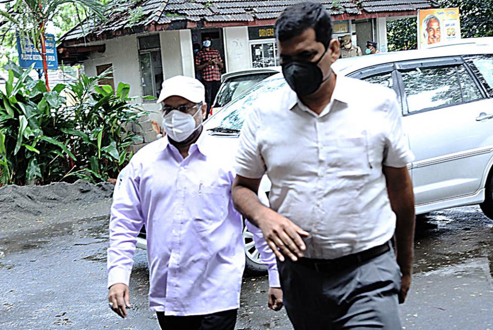 Bishop Franco Mulakkal of Jalandhar (in white hat and mask) arrives at the District and Sessions Court in Kottayam, Kerala, Sept. 16, 2020, to stand trial in a rape case against him. (Saji Thomas)