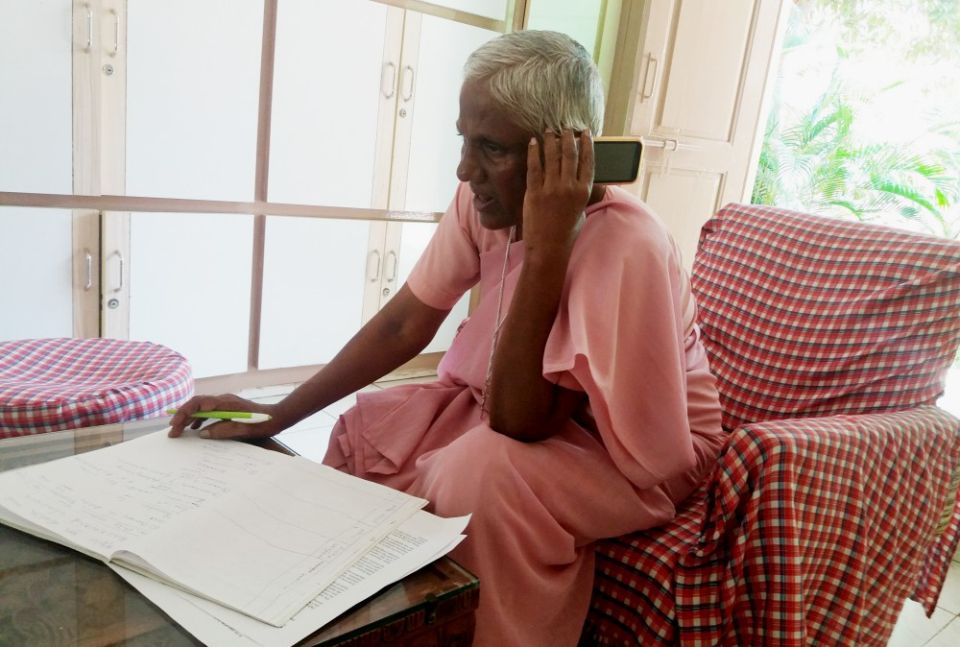 Sr. Anthonysami Alphonsa takes a call at the Franciscan Sisters of St. Aloysius Gonzaga headquarters in Puducherry, southern India. (Philip Mathew)