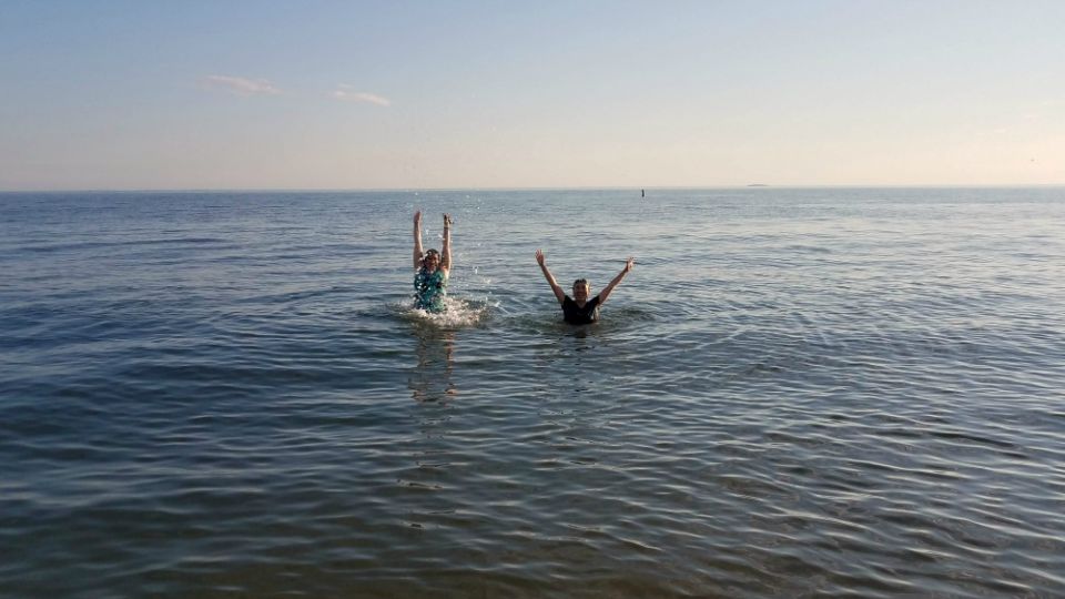 Srs. Ana Gonzalez, left, and AnHoa Nguyen enjoy the water of the Long Island Sound at Hammonasset Beach State Park in Madison, Connecticut, this past summer. (Provided photo) Srs. Ana Gonzalez, left, and AnHoa Nguyen enjoy the water of the Long Island Sound at Hammonasset Beach State Park in Madison, Connecticut, this past summer. (Provided photo)