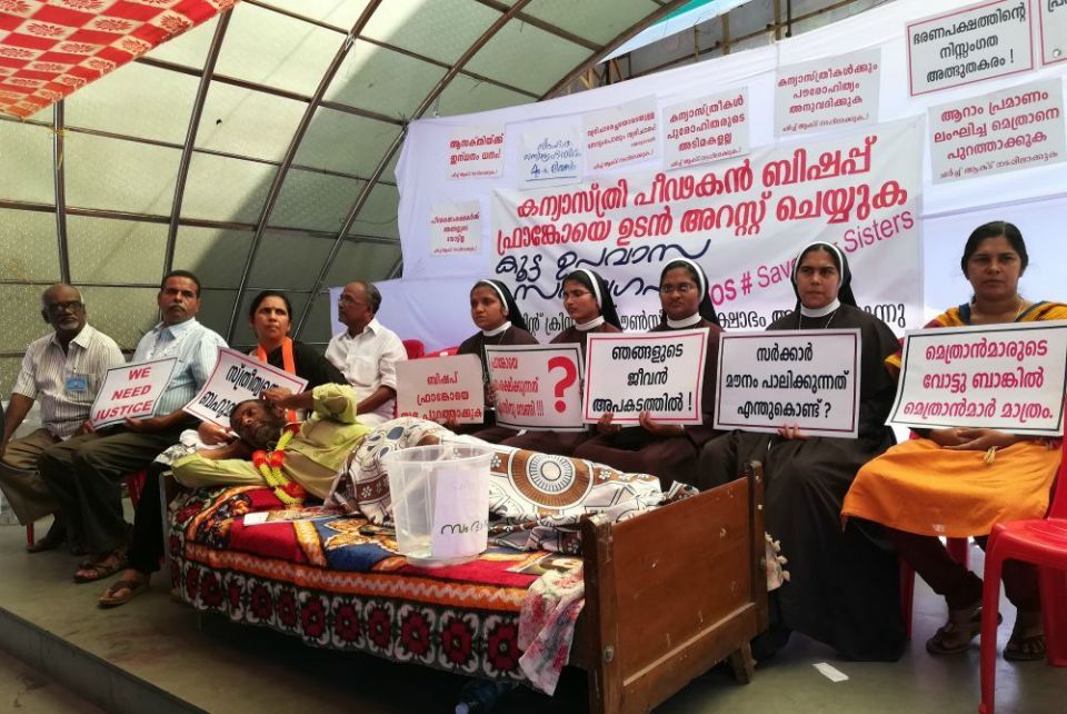 In this September 2018 file photo, Missionaries of Jesus and supporters stage a sit-in near the High Court of Kochi in the southwestern Indian state of Kerala, demanding the arrest of Bishop Franco Mulakkal of Jalandhar. (Saji Thomas)