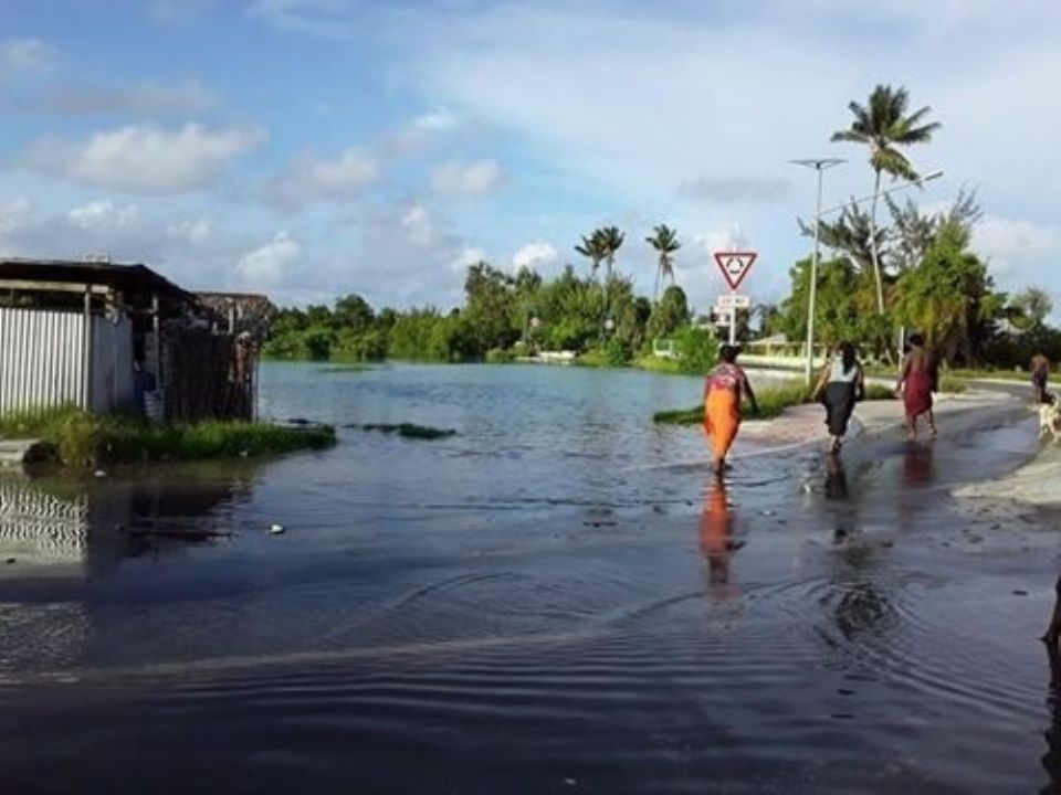 Flooded streets are common in Kiribati. The Good Samaritan Sisters support initiatives to combat climate change, including mangrove planting, rubbish recycling and composting. (Courtesy of Meg Kahler)