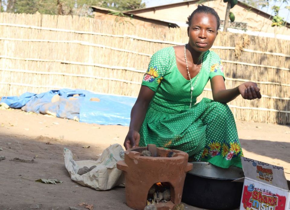 Marlene Usiku, 30, is a member of the Eco Women Group. After training from the sisters, she uses briquettes instead of charcoal or firewood to cook. (Doreen Ajiambo)